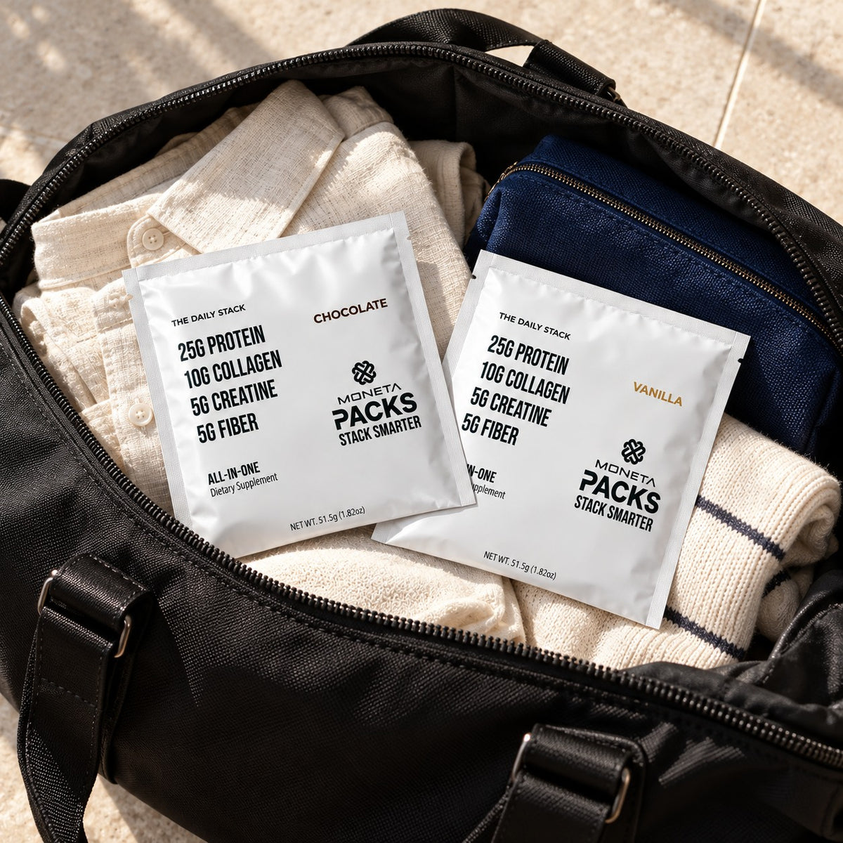 Moneta PACKS packed in a weekend bag